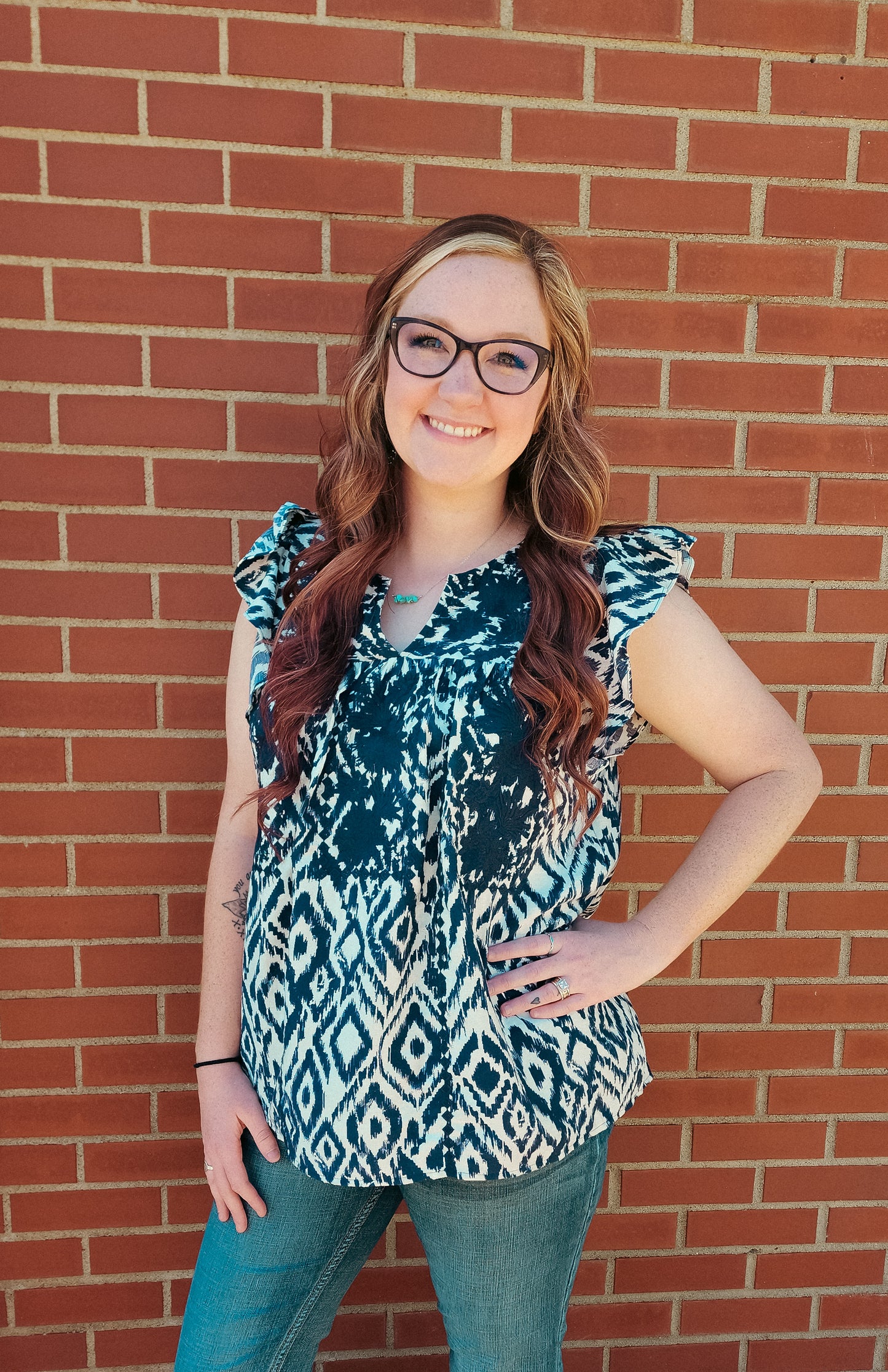 Navy floral embroidered top