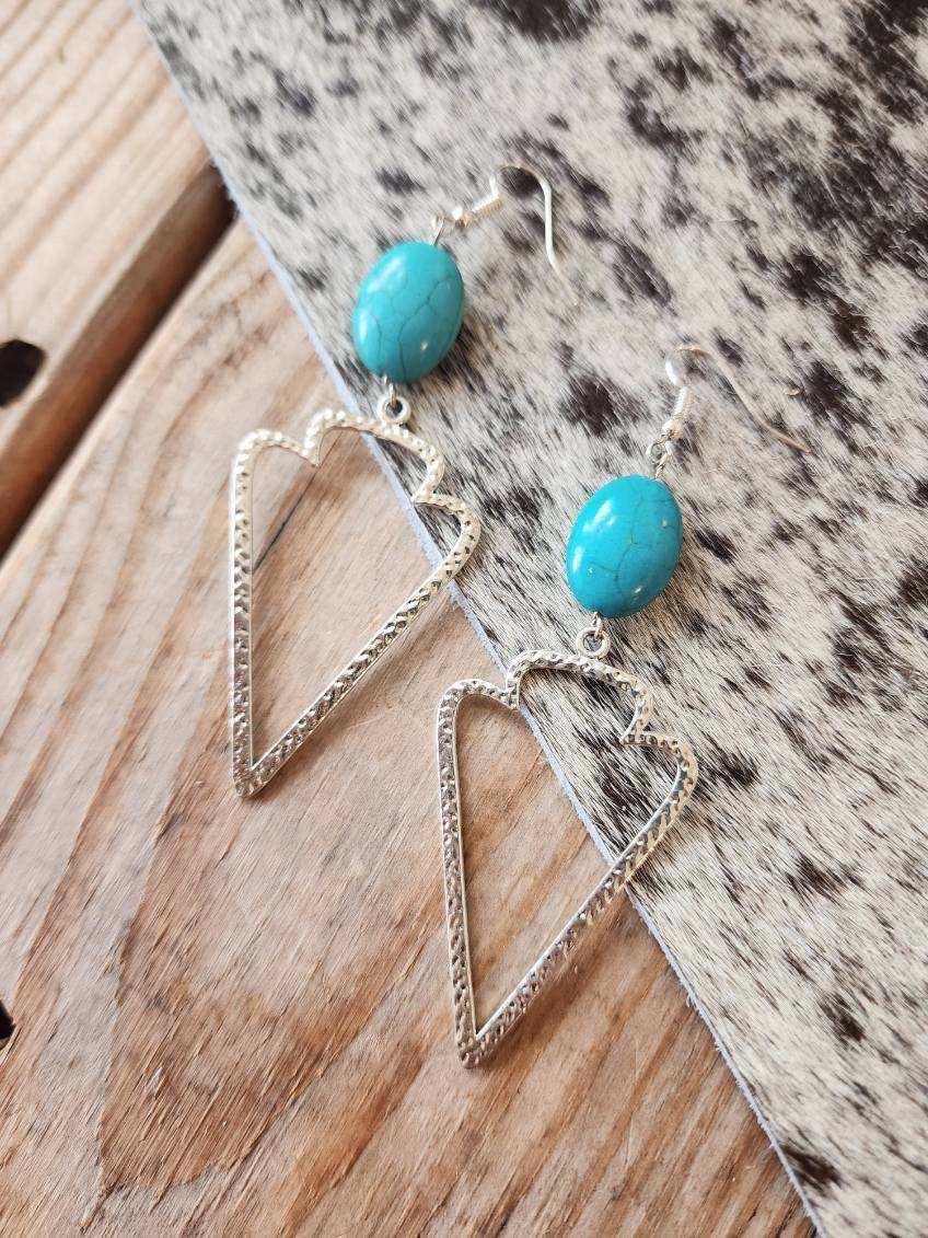 Arrow head with turquoise stone